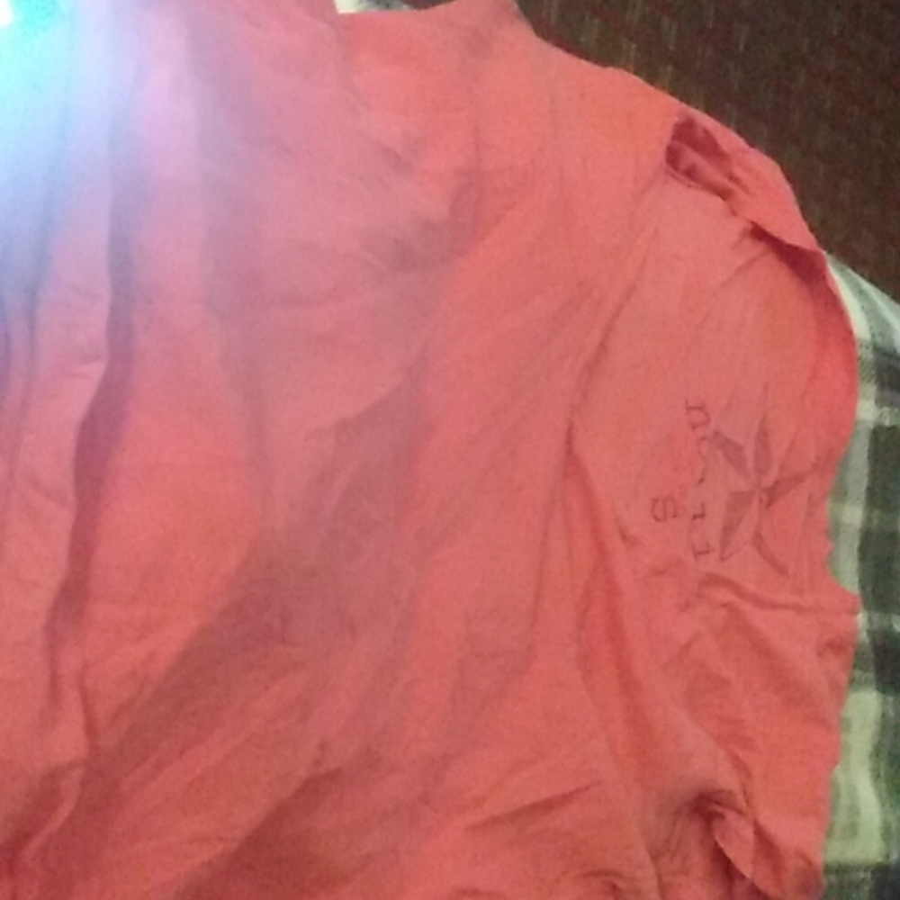 Nollie T-shirt kinda slightly worn size is Small but could also fit a medium.